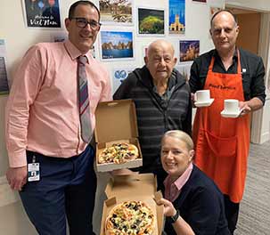 Catering Manager Peter Trusler, patient Bob Avery, Occupational Therapy Assistant Sarah Straughan and Catering Assistant Peter Seddon celebrated Italy with Pizza.