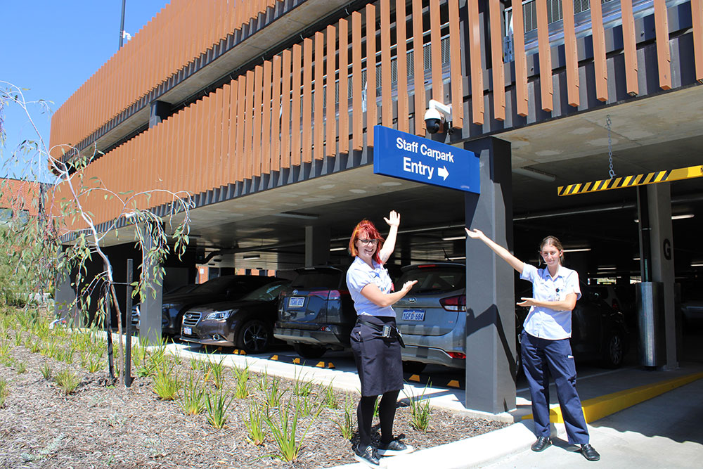 Hollywood Private Hospital nurses Hayllie Gilbert and Lily Stachewicz outside the new staff carpark.