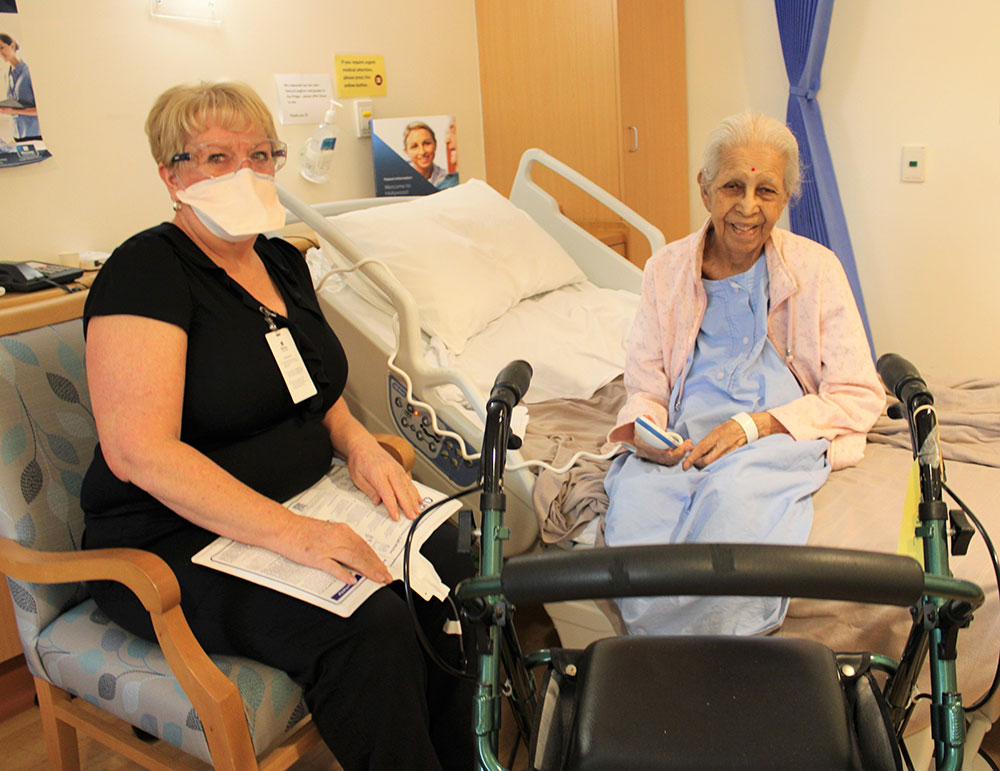 Clinical Nurse Manager Tracey Sariago with Gowramma Kaushik (102).